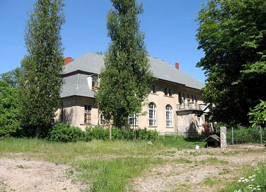 Zesp&oacute;ł pałacowo-folwarczny w Grapicach